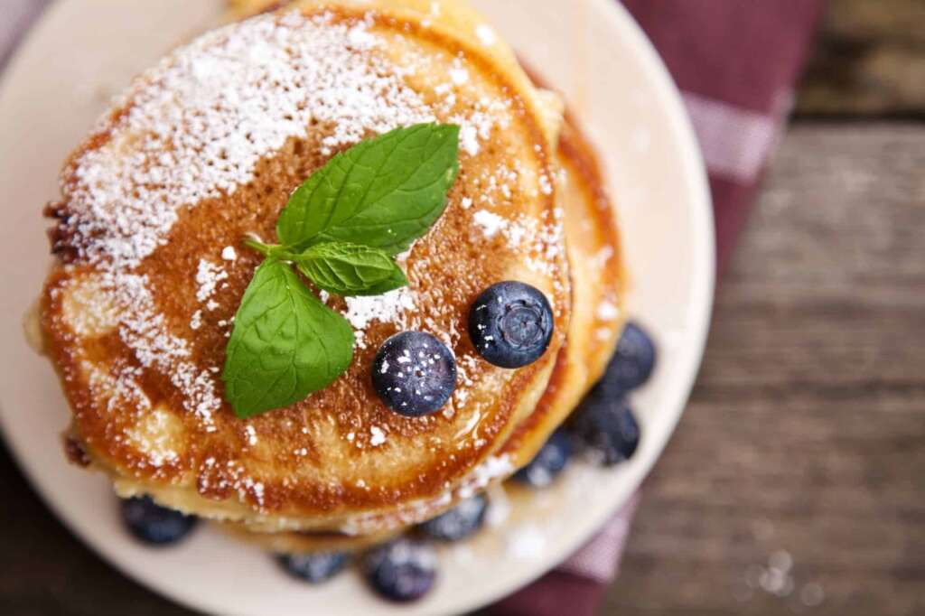 Delicious pancakes with blueberry and mint